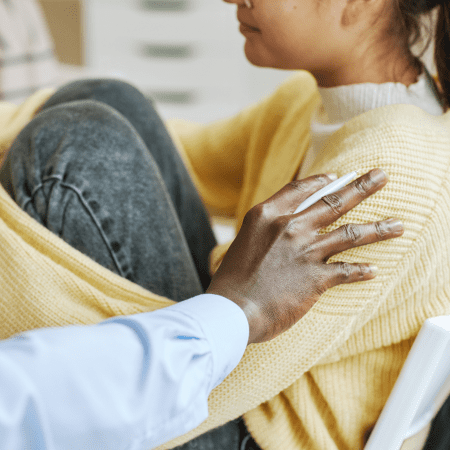 A young women crying in therapy